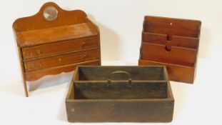 A 19th century mahogany stationery rack, a jewellery cabinet in the form of a miniature chest of