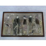 An early 20th century oak framed and glazed Chinese silk embroidery of noblemen and their attendants