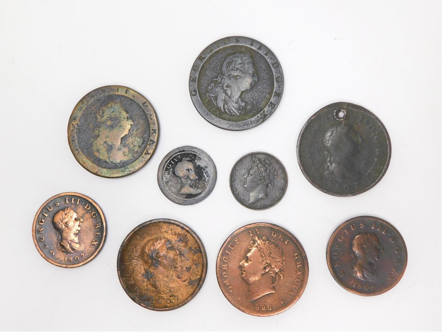 A collection of nine 19th century George III and George IV coins. Including two cartwheel pennies