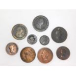 A collection of nine 19th century George III and George IV coins. Including two cartwheel pennies