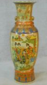 A large ceramic painted and transfer design Oriental vase with gilded lion's head ring handles.