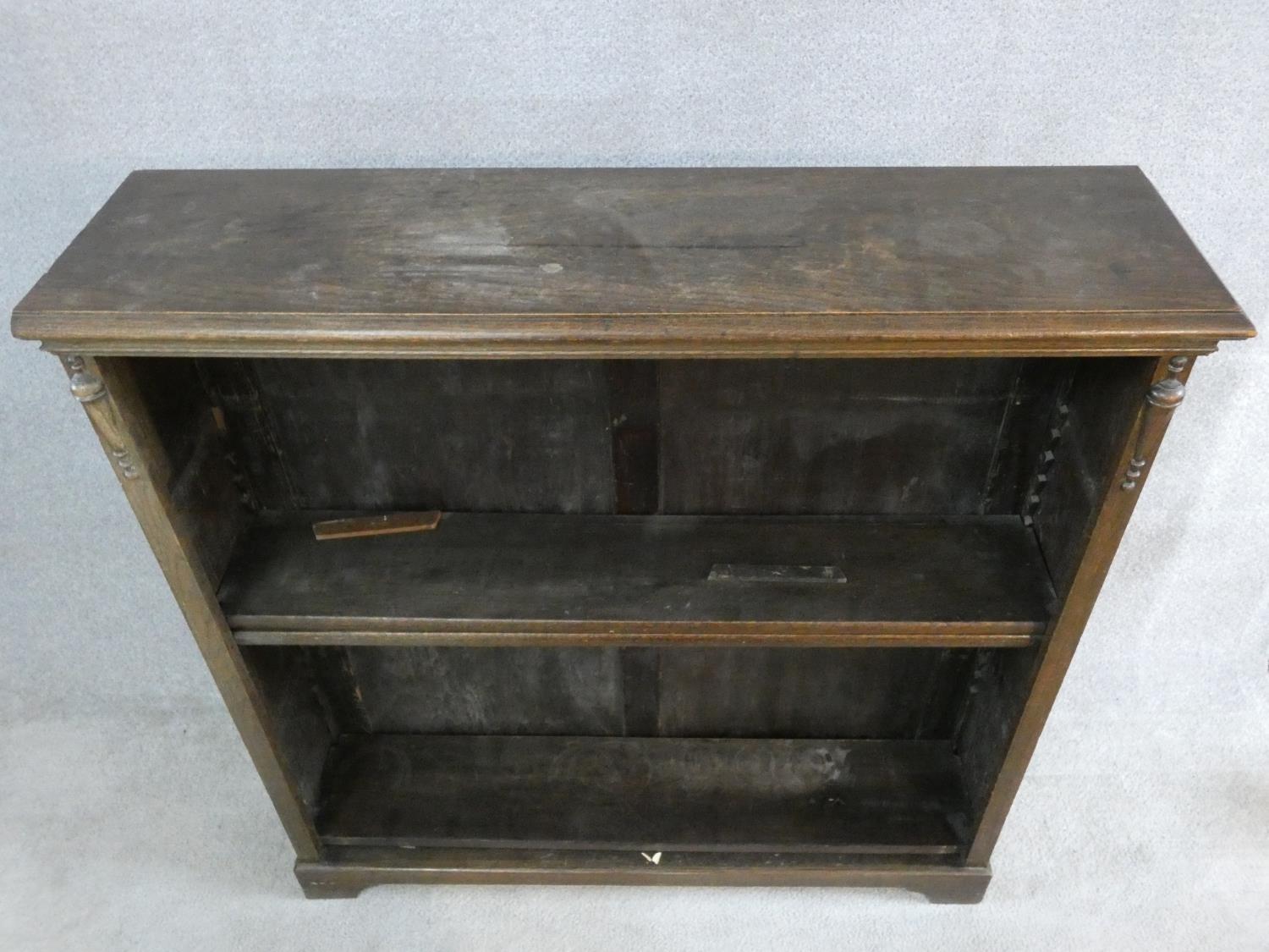 A mid century vintage oak open bookcase on bracket feet. H.107 W.106 D.29cm - Image 3 of 6