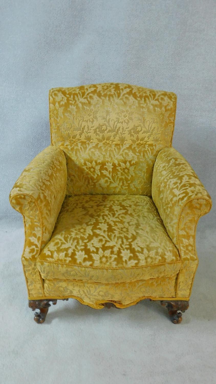 A pair of Georgian style armchairs in gold cut floral upholstery on walnut carved cabriole supports. - Image 2 of 10