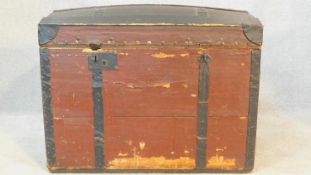 An early 20th century painted metal bound domed top travelling chest. H.55 W.72 D.45cm