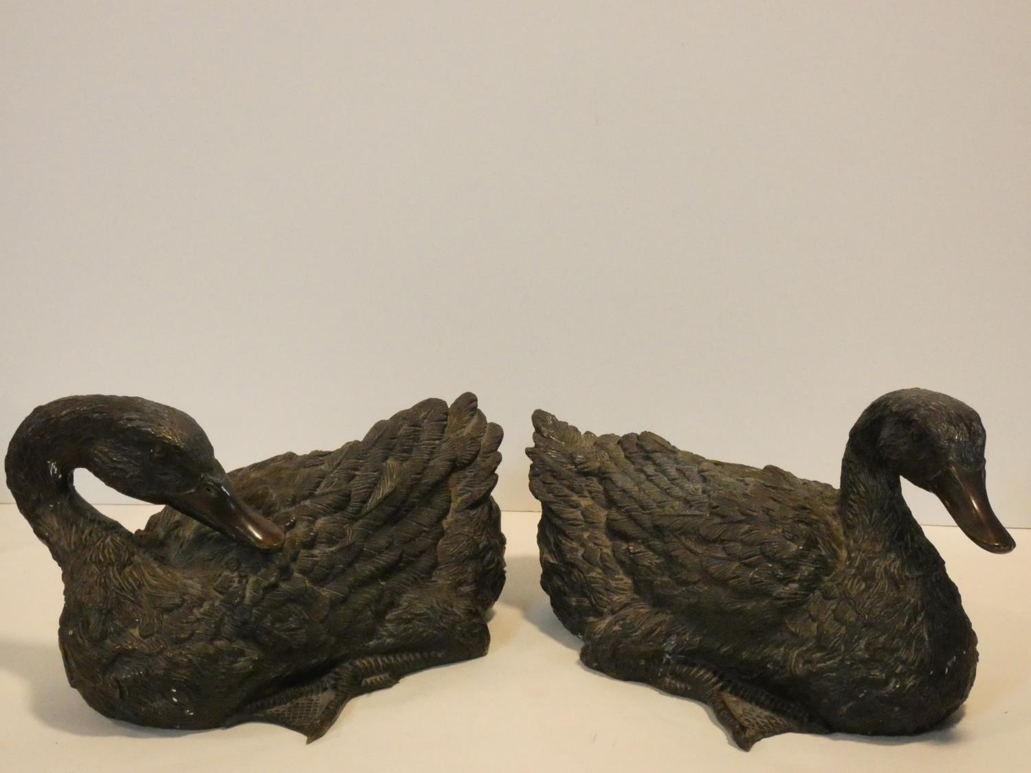Two Japanese bronze figures of resting ducks. Intricately detailed. L.30x W.19 D.19cm