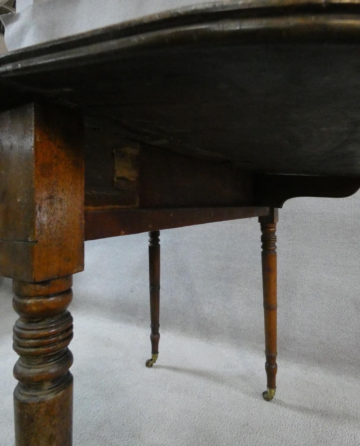 A 19th century mahogany Pembroke table with frieze drawer opposing dummy drawer raised on turned - Image 4 of 6