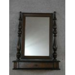 A 19th century Continental burr elm swing toilet mirror with drawer fitted to the base with original