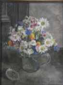 Constance Morton (1905-1992) a framed oil on canvas, signed and inscribed to the reverse; Flowers in