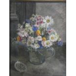 Constance Morton (1905-1992) a framed oil on canvas, signed and inscribed to the reverse; Flowers in