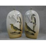 A pair of large contemporary transfer design ceramic vases with oriole birds, one perched on a