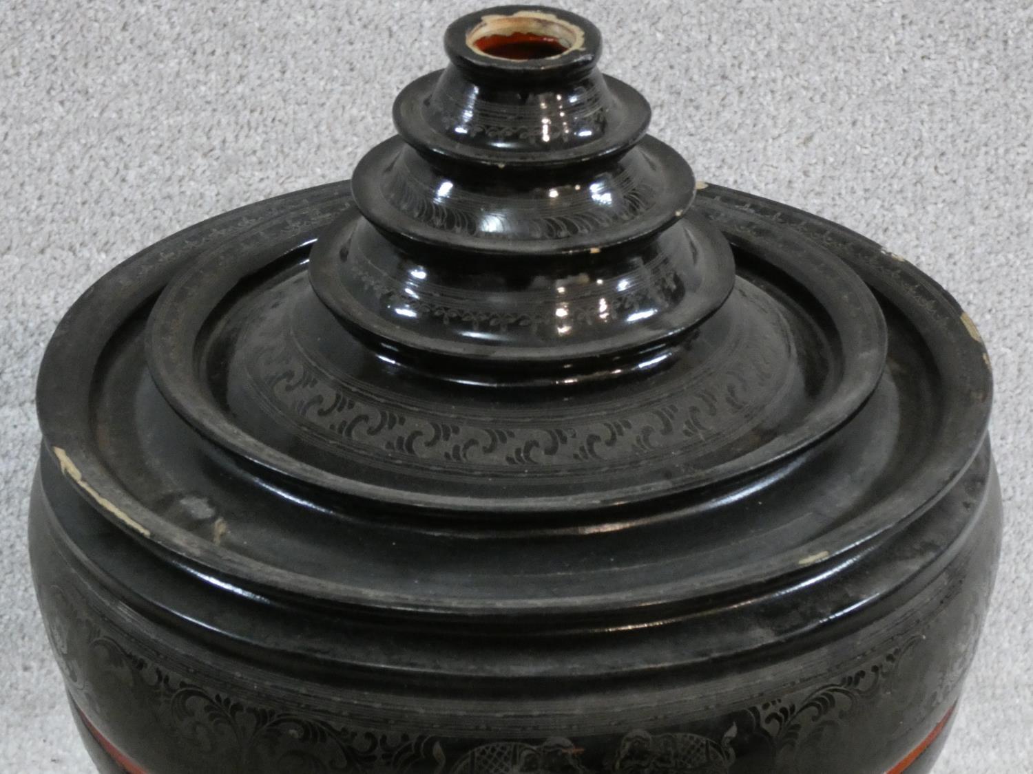 A lacquered and engraved Burmese food offering vessel (Hsunok) with removable lid. It has a red - Image 3 of 6