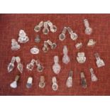 A miscellaneous collection of twenty nine cut crystal and other decanter and scent bottle