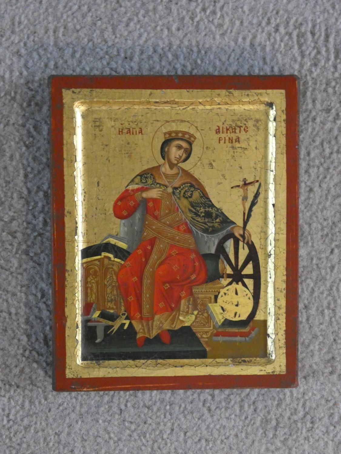 A certified copy of a Byzantine painted icon of Saint Catherine on panel with gilded detailing. H. - Image 2 of 4