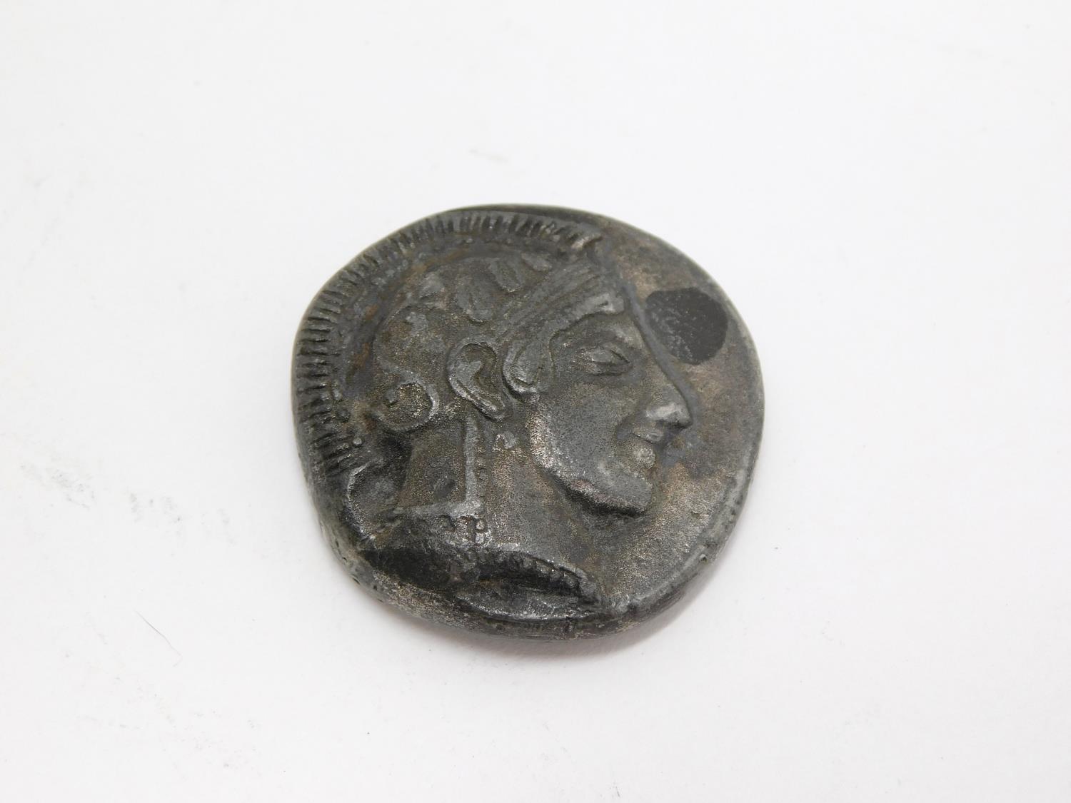 Coin in the manner of Attica, Athens AR Dekadrachm. Circa 469/5-460 BC. Head of Athena right,