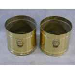 A pair of circular vintage brass coal buckets with lion head handles. H.28xD.30cm