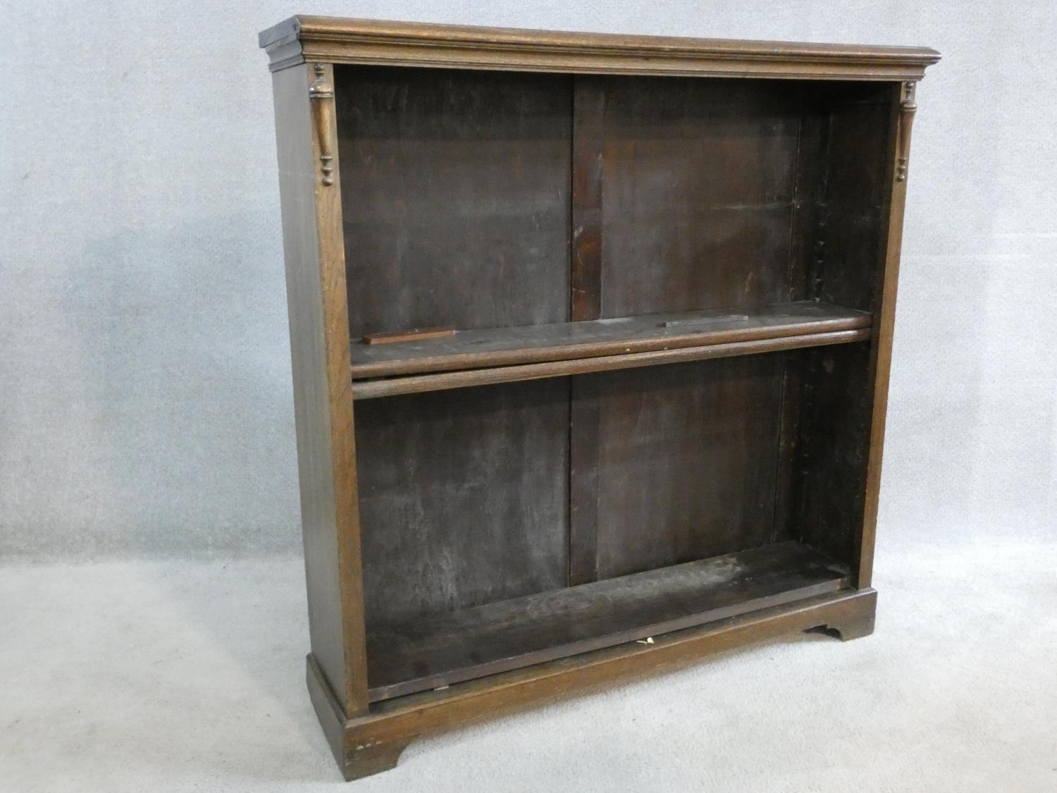 A mid century vintage oak open bookcase on bracket feet. H.107 W.106 D.29cm - Image 2 of 6