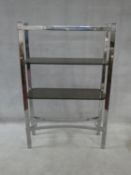 A vintage chrome and smoked glass two tier etagere. H.140xW.91xL.30cm