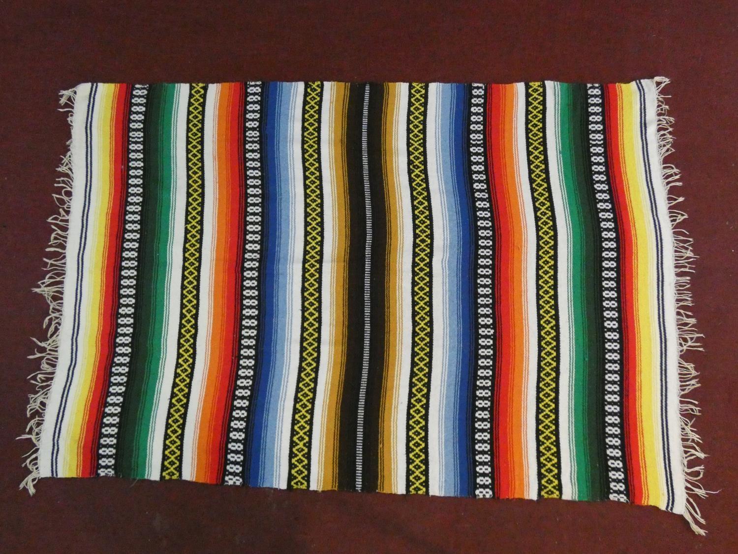 A flatweave Central American kelim in multicoloured bands. H.210xW.148cm