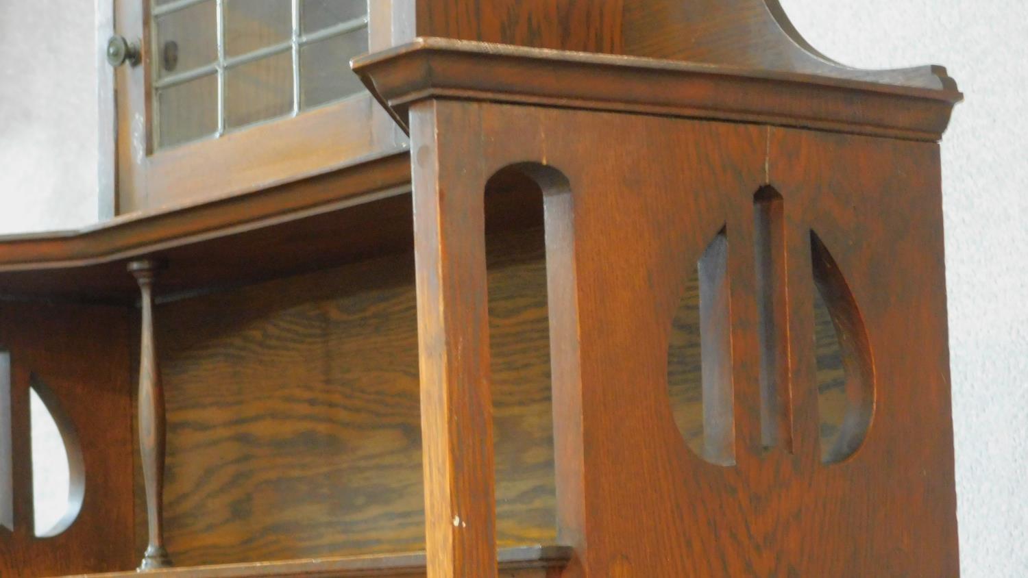 A late 19th century oak Art Nouveau bookcase in the Glasgow School style with leaded glazed - Image 5 of 8