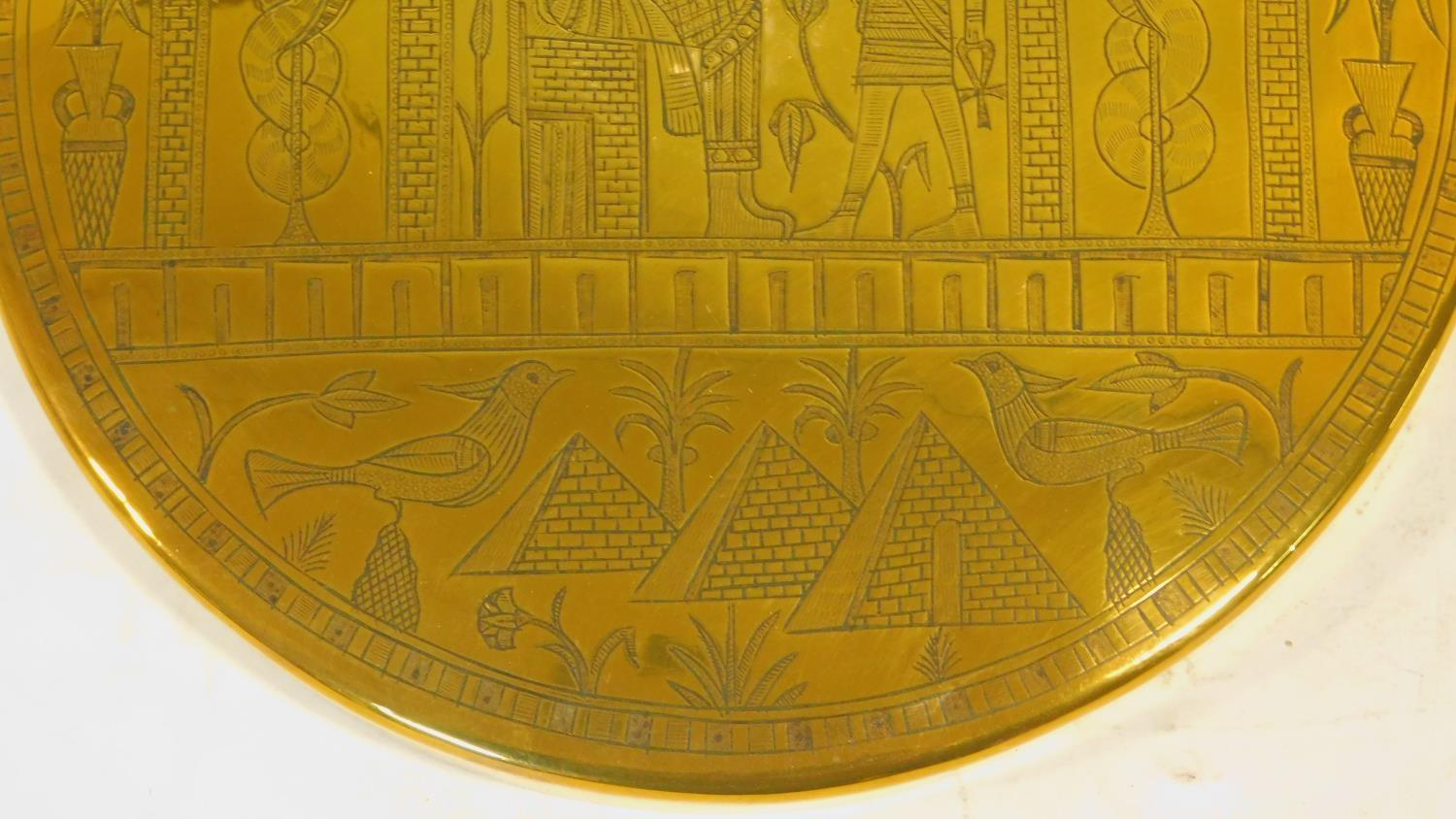 A vintage Egyptian revival engraved brass domed wall plaque with Eygptian symbols and Pharaohs. - Image 3 of 4