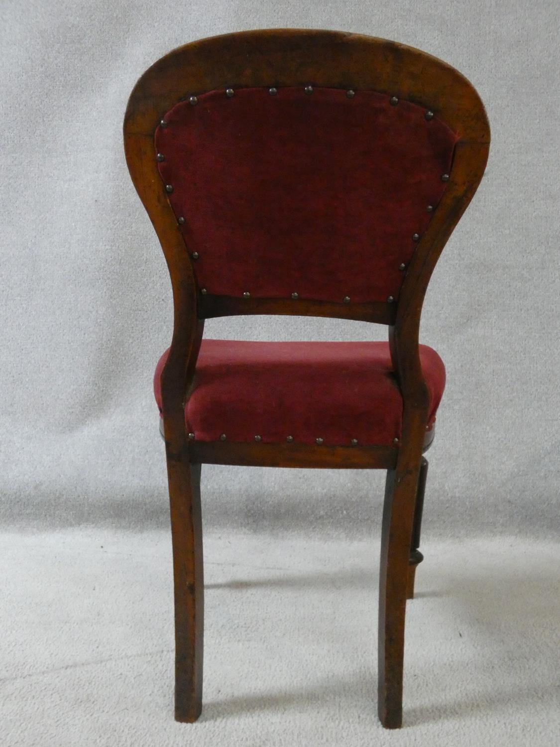 A set of four Victorian mahogany hooped back dining chairs in burgundy velour upholstery on reeded - Image 7 of 9