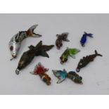 A miscellaneous collection of Chinese articulated fish pendants to include, bronze, silver and multi