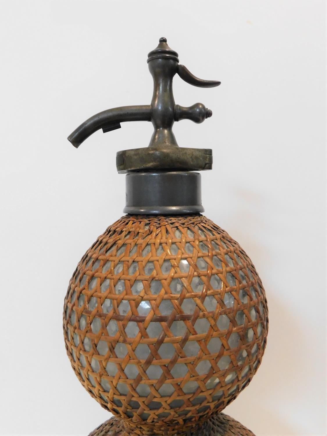 A vintage double gourd shaped blown glass wicker bound soda syphon stamped and patented by the - Image 2 of 6