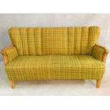 A mid century vintage Continental satin birch framed sofa in lemon and sage woven textile