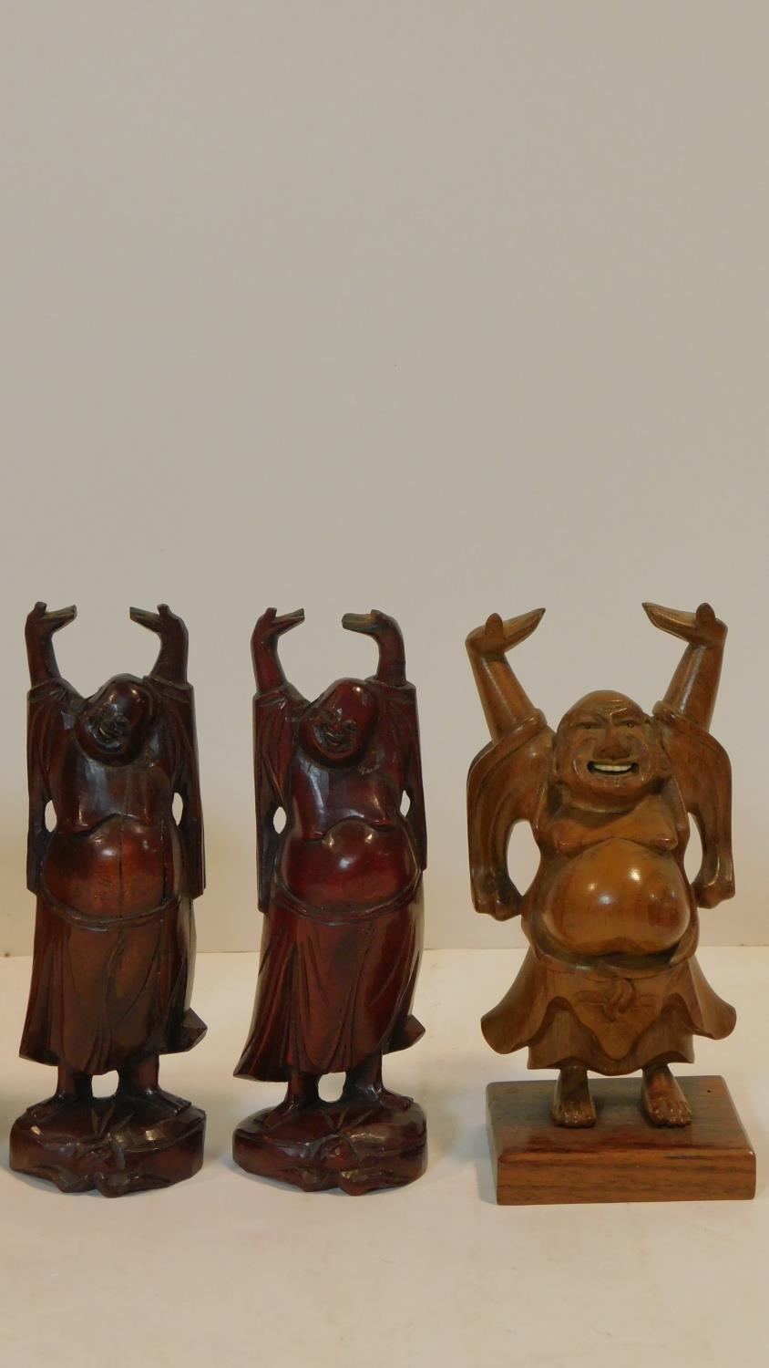 Three vintage carved Japanese hardwood happy Buddha's with raised arms, one with bone teeth along - Image 3 of 8