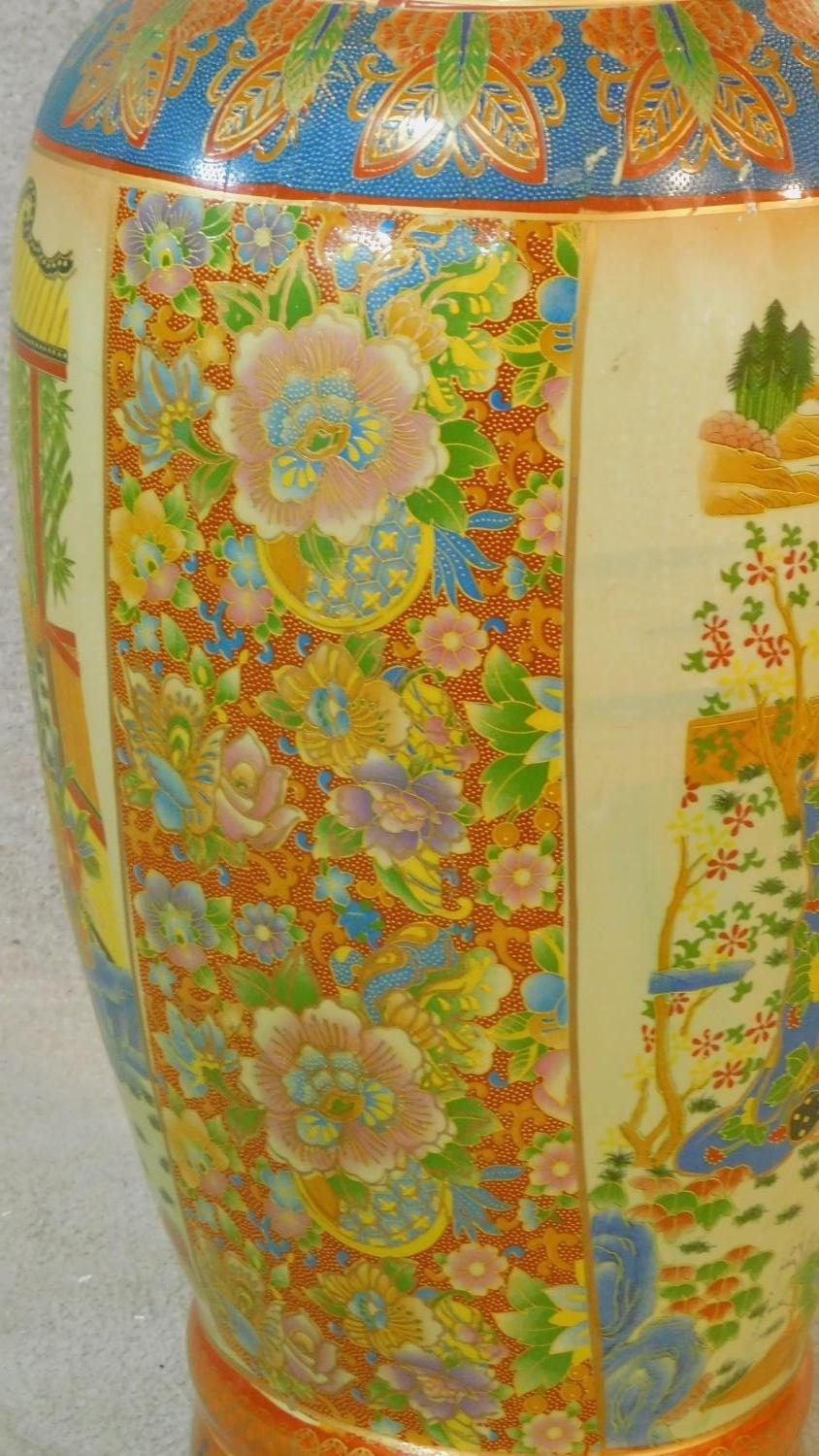 A large ceramic painted and transfer design Oriental vase with gilded lion's head ring handles. - Image 4 of 8