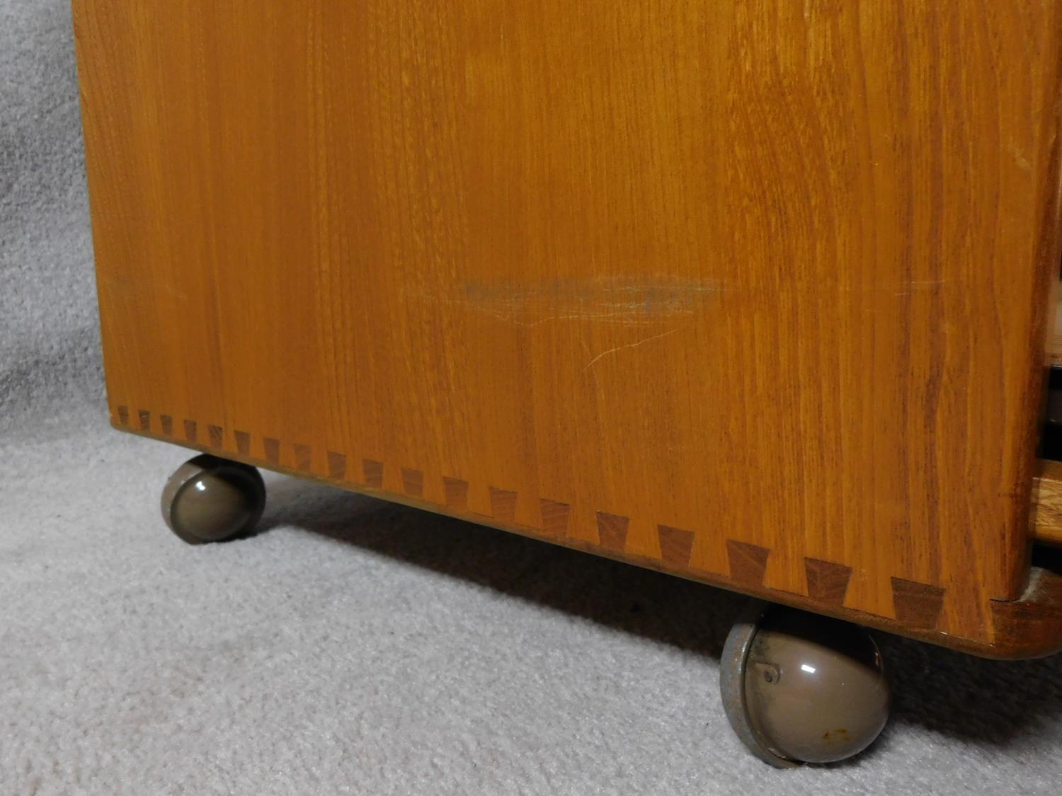 A vintage elm Ercol cabinet with panel doors and drop down base door fitted for HI Fi. H.94xW.85xL. - Image 8 of 13