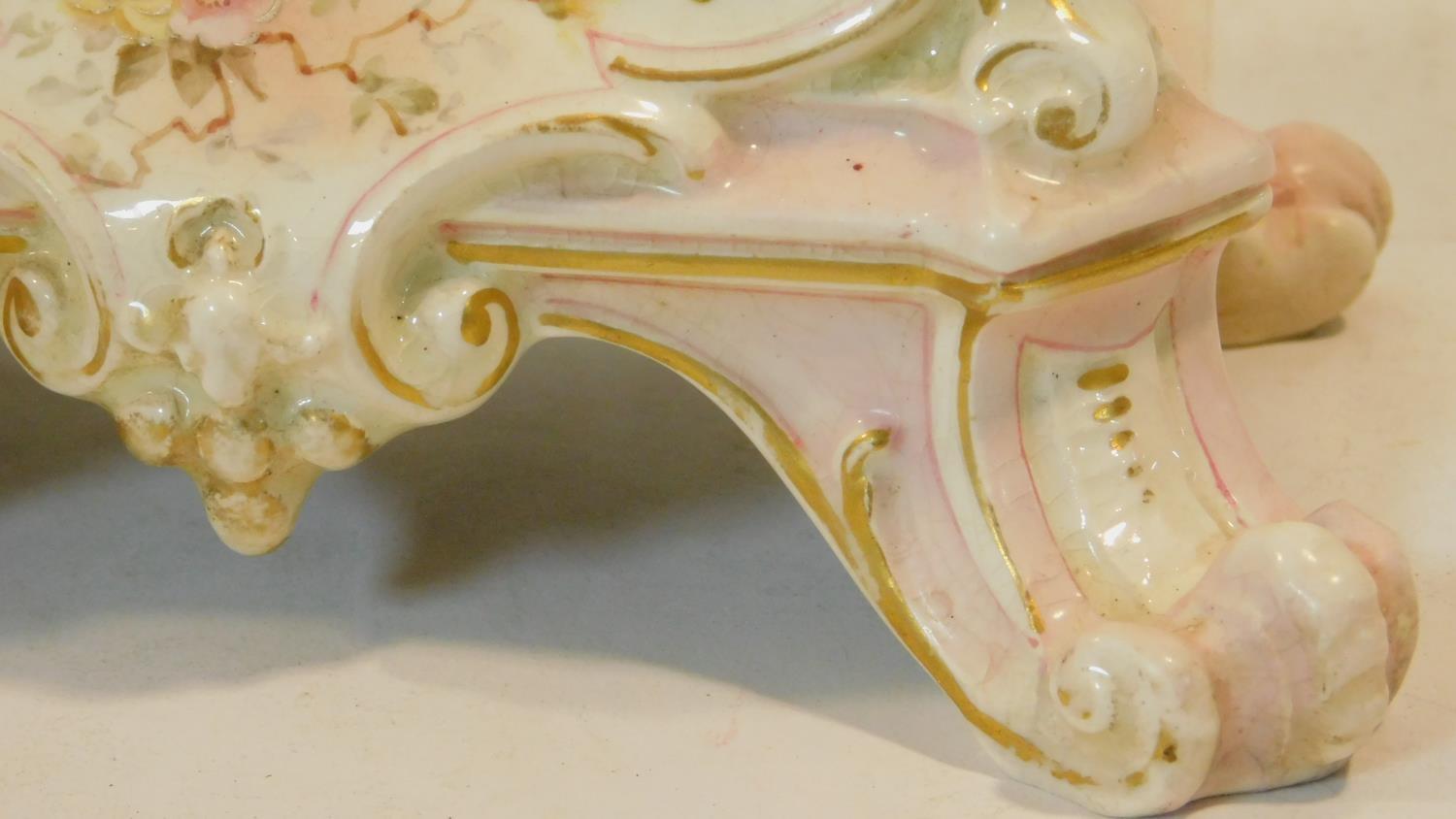 A porcelain hand painted antique gilded mantel clock with floral details and white enamel dial - Image 7 of 13