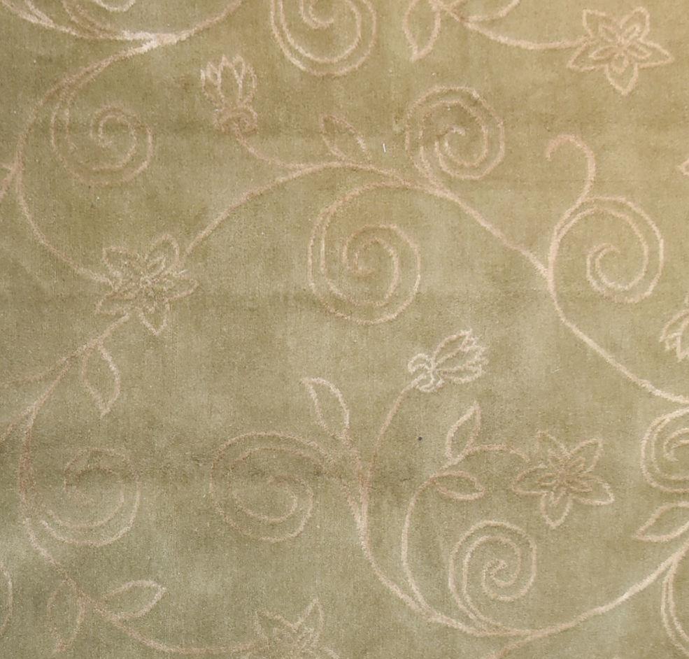 A silk and wool rug with allover scrolling foliate and flowerhead design on a taupe background. L. - Image 2 of 3