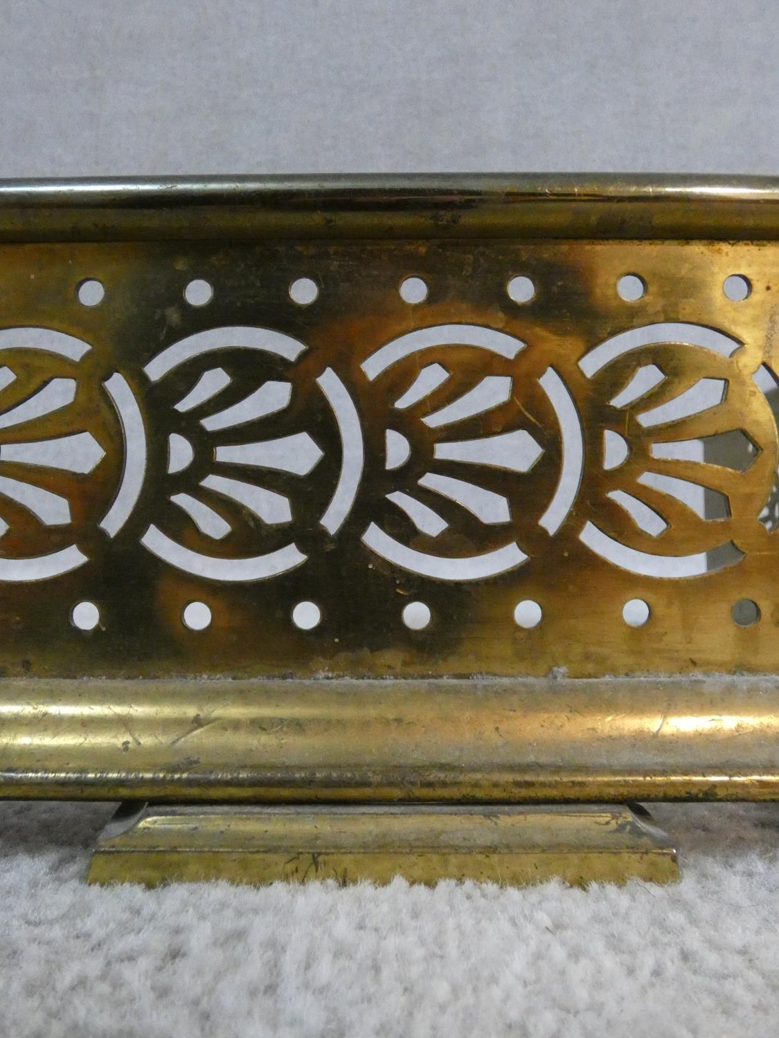 A 19th century pierced brass fire fender resting on stepped bracket feet. H.14xW.118xL.30cm - Image 5 of 5