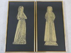 A pair of gilt framed and glazed brass rubbing panels, medieval figures. H.65xW.34cm