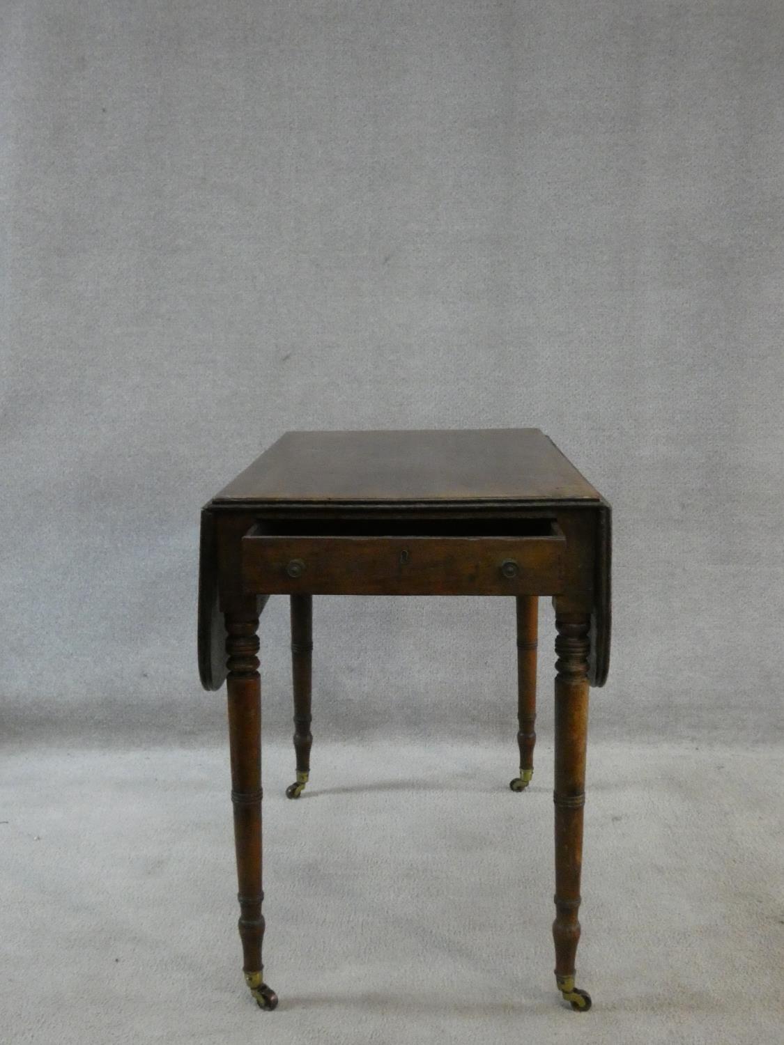 A 19th century mahogany Pembroke table with frieze drawer opposing dummy drawer raised on turned - Image 6 of 6