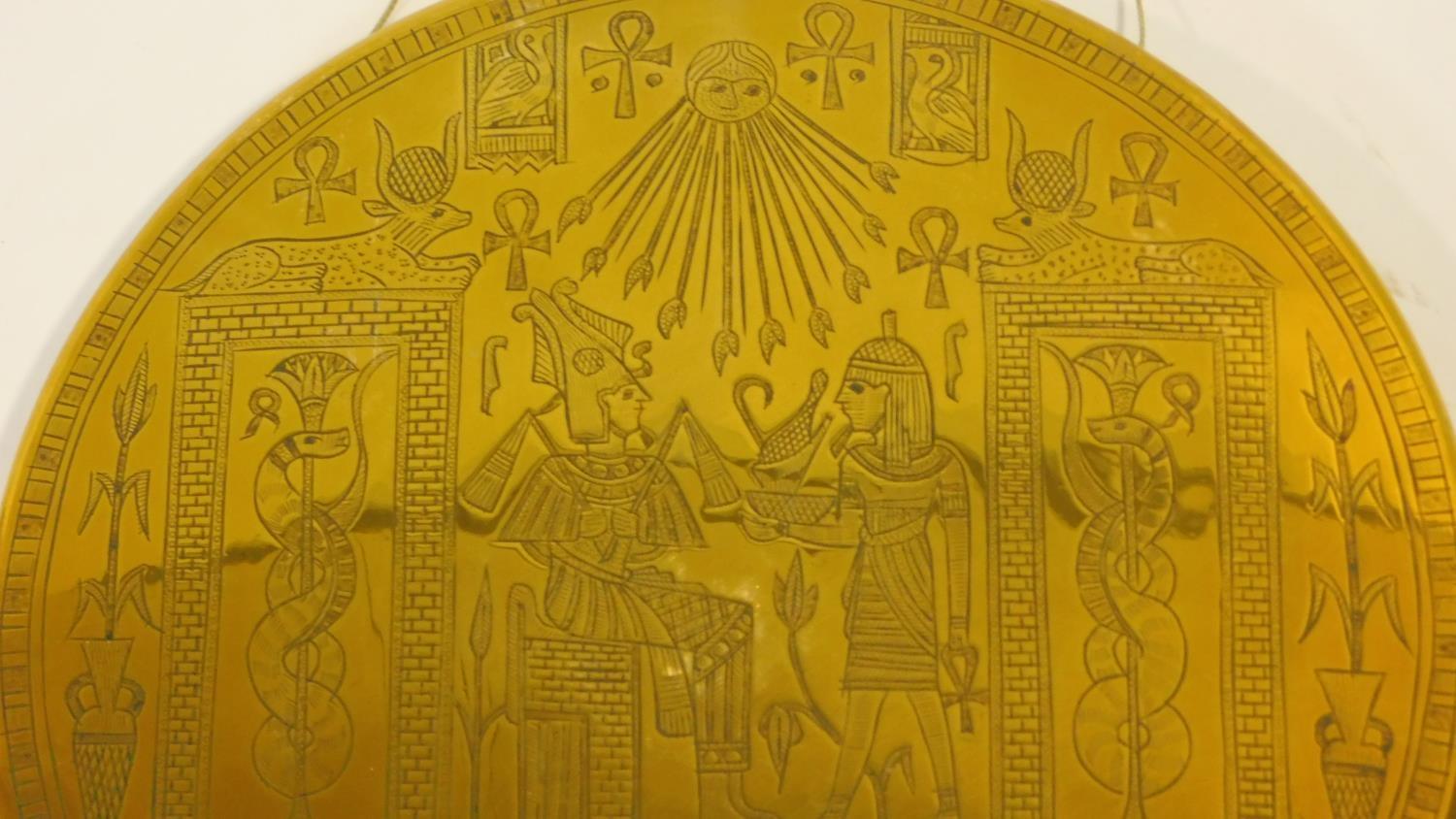 A vintage Egyptian revival engraved brass domed wall plaque with Eygptian symbols and Pharaohs. - Image 2 of 4