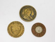 A collection of antique coins. Including a Victorian two metal One Penny Model coin, 1790 George III