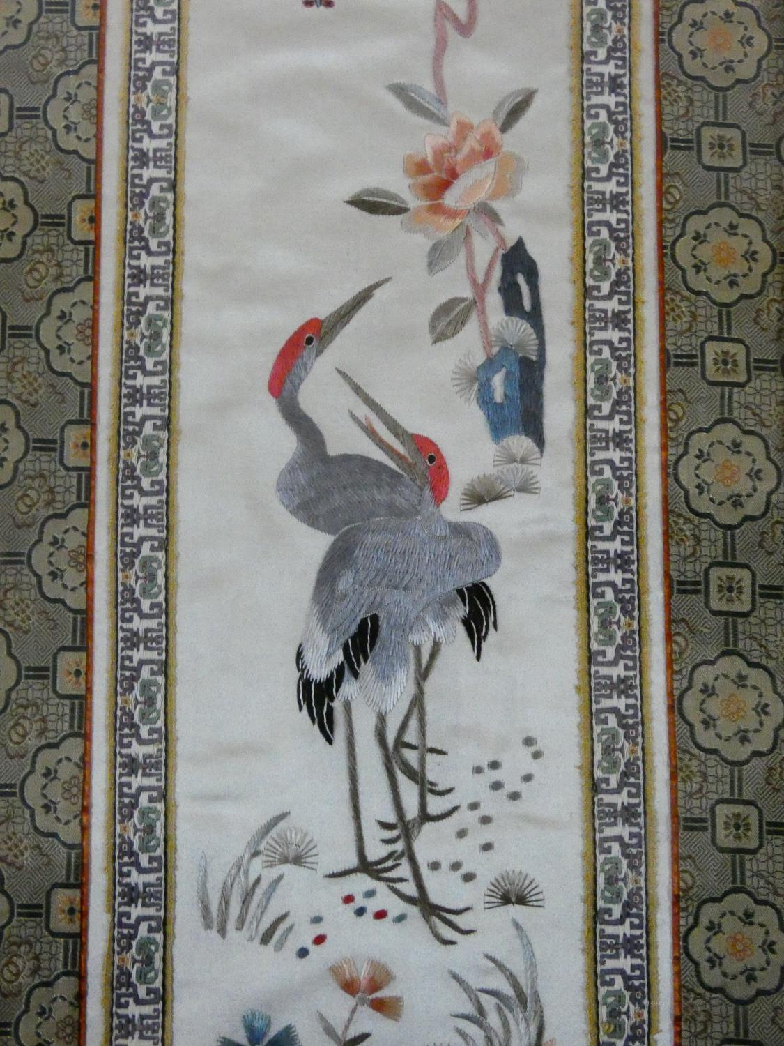 A framed and glazed Chinese panel, storks and foliate decoration within a stylized flowerhead - Image 3 of 5