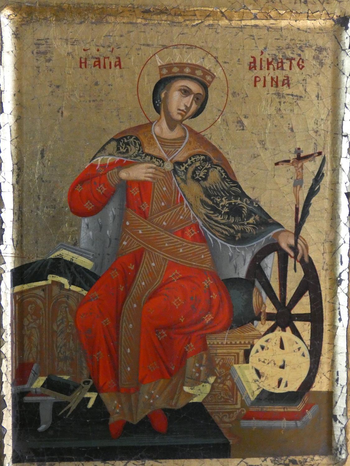 A certified copy of a Byzantine painted icon of Saint Catherine on panel with gilded detailing. H.