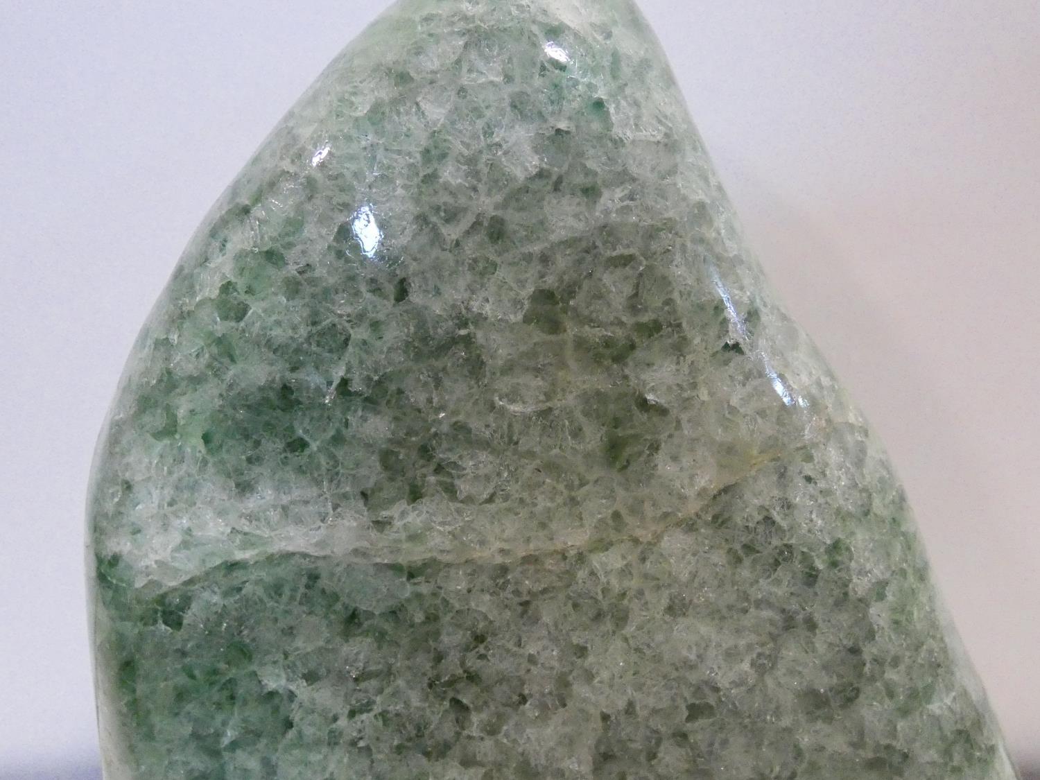 A large polished green stone crystal boulder. L.31cm - Image 2 of 7