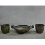 A pair of brass jardinieres with Adam style husk and ribbon decoration and a brass twin handled