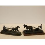 A bronze figure group of a Russian driving a horse drawn sledge and a similar of a young 19th