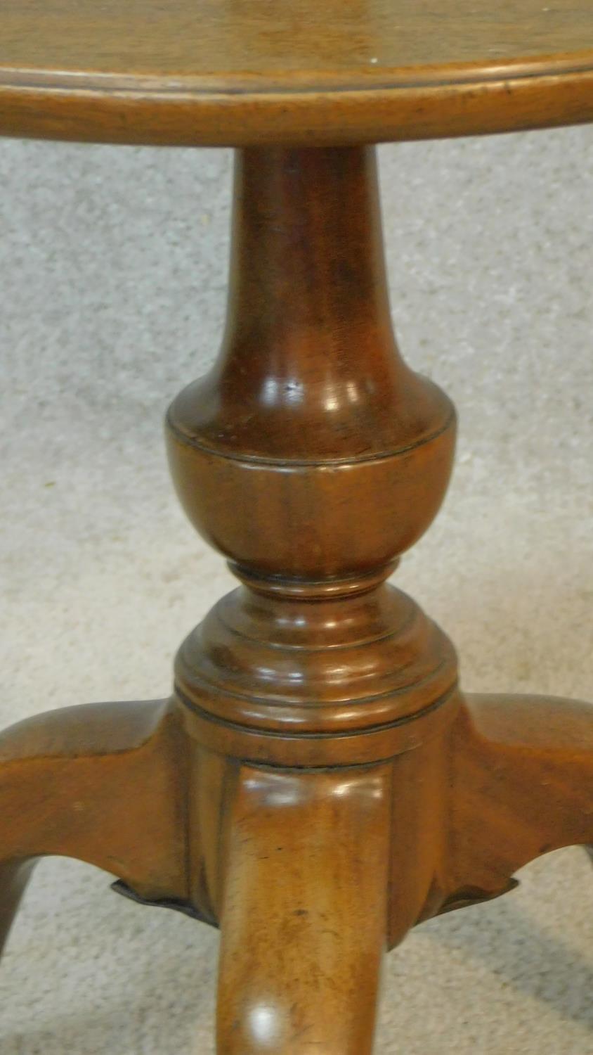 A 19th century mahogany two tier dumb waiter with turned finial to the top and central column on - Image 4 of 9