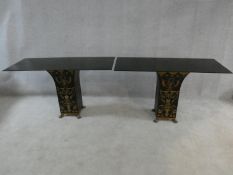 A pair of Regency style pedestal occasional tables with painted and lacquered shaped facetted
