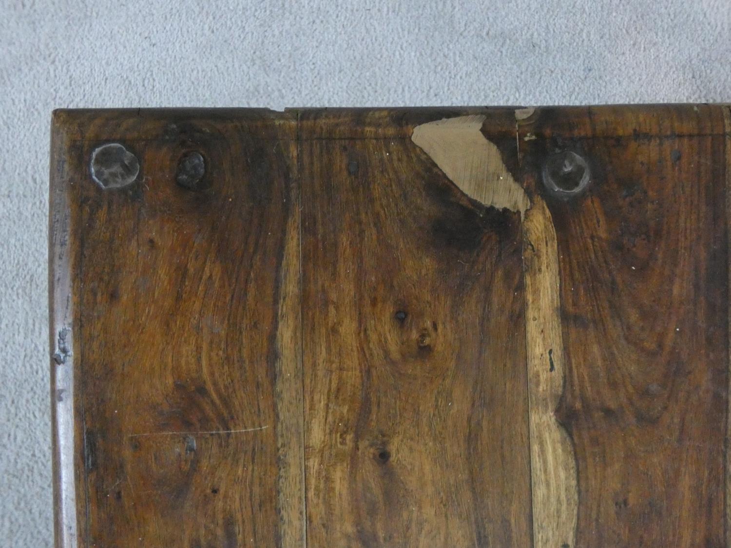 An Indian iron bound hardwood low table on circular section supports. H.42xW.80xL.80cm - Image 4 of 9