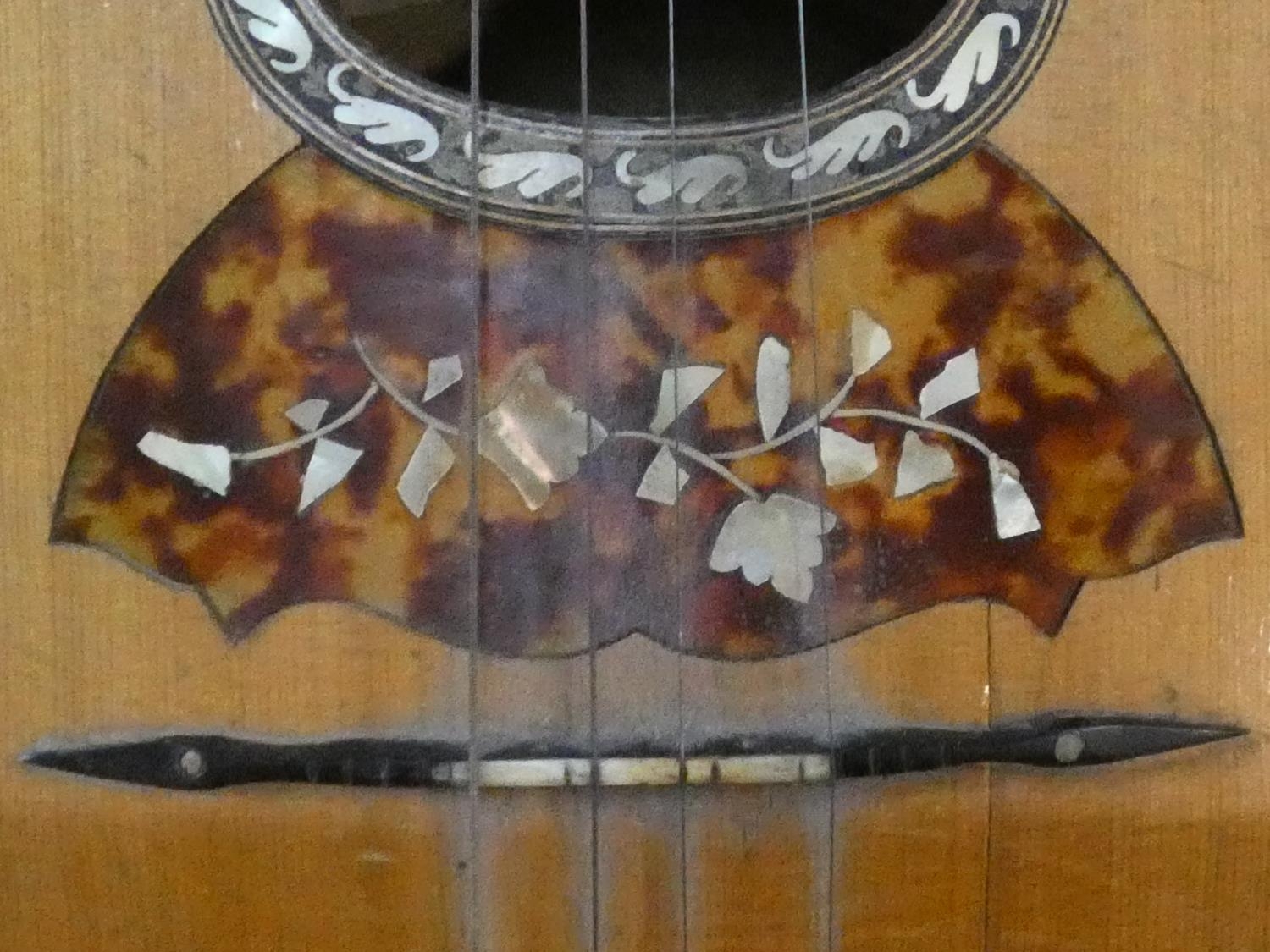 An early 20th century mandolin with mother of pearl and tortoiseshell inlay, signed Ozelli and - Image 4 of 13