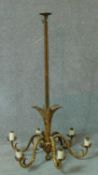 A gilt metal six branch chandelier with acanthus scroll arms and central column. 112x62cm