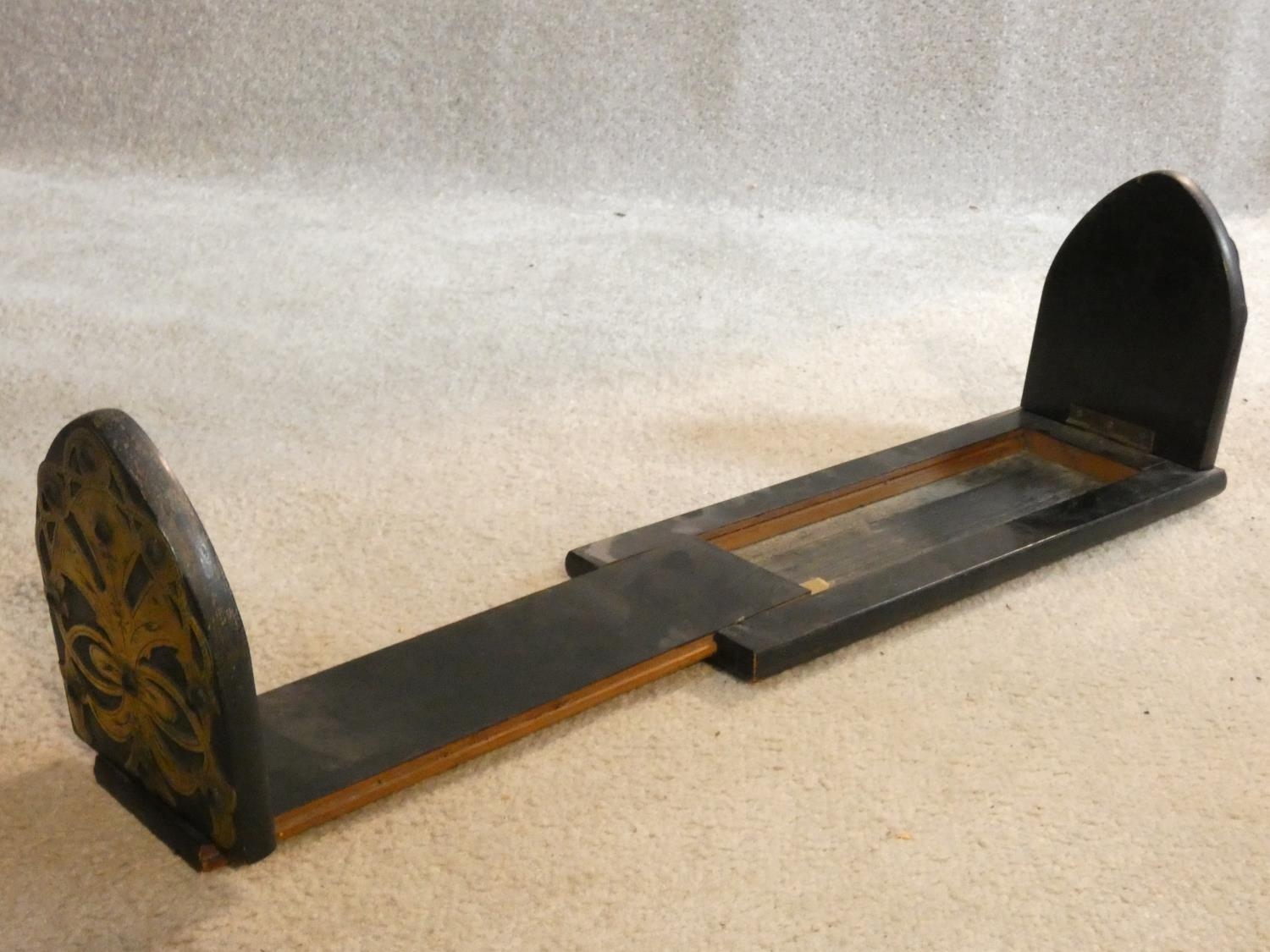 A Victorian ebonised desk top book slide with engraved pierced brass bound arched ends. 33x13cm - Image 6 of 7