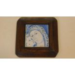 A framed painted ceramic tile, head study of the Madonna and child, signed B, Morrell. 19x19cm